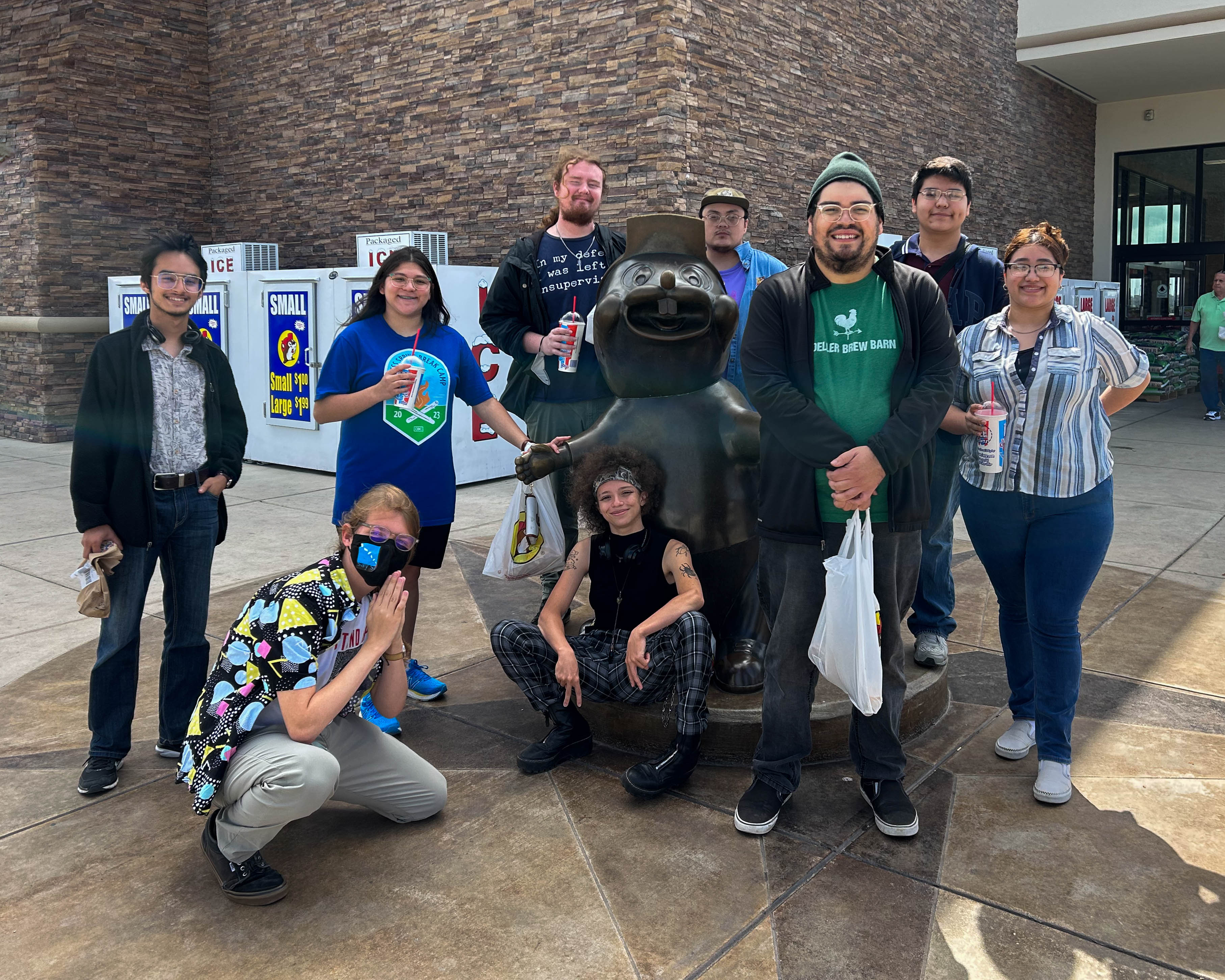 Students and staff in the Media Arts program outside of Buc-ee's.