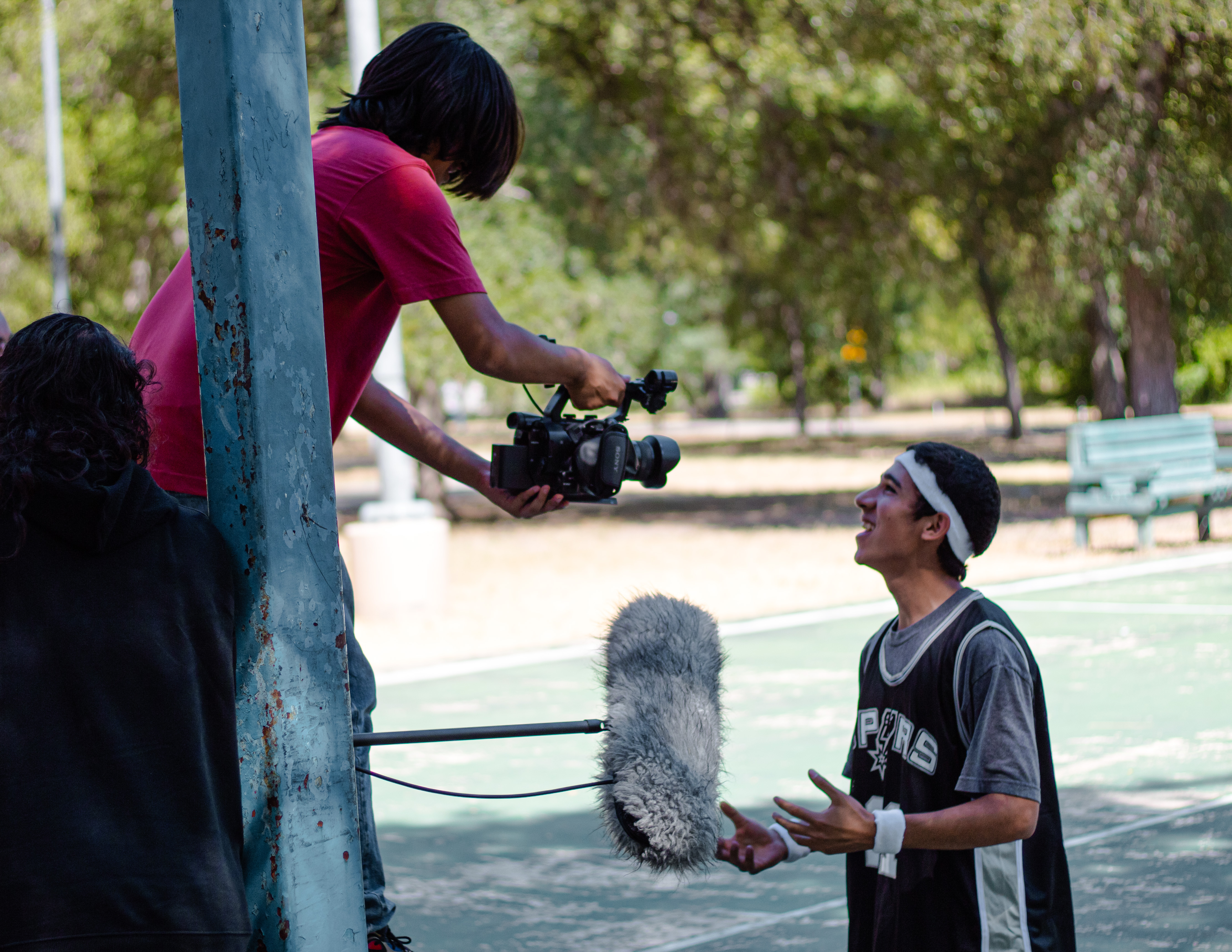 Students filming a scene in DUNKIN'.